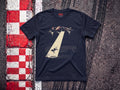 Alien Abduction F1 t-shirt in Navy, flat lay on a race track kerb