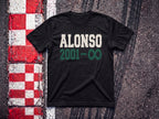 Alonso to Infinity F1 t-shirt in Black, flat lay on a race track kerb