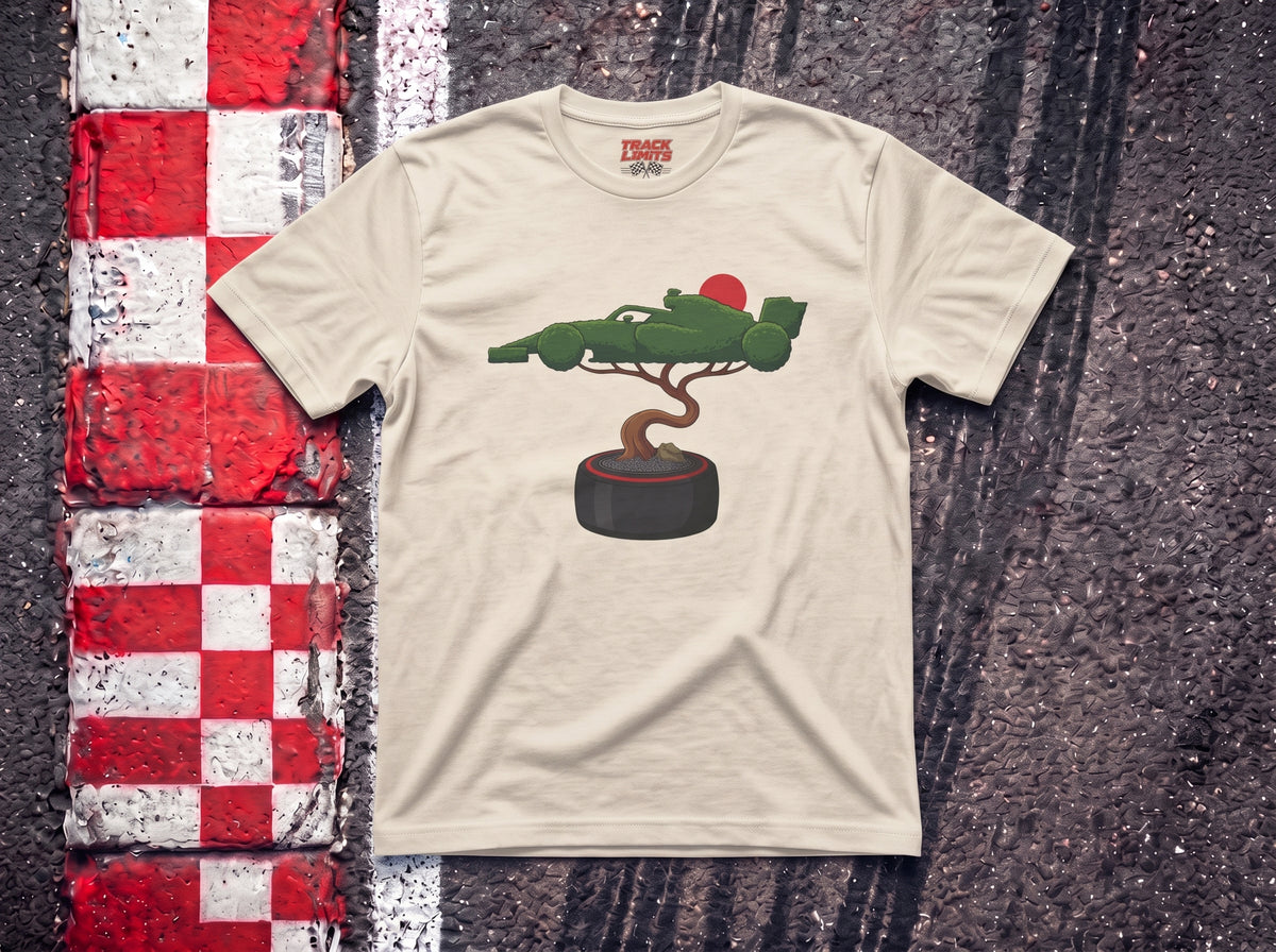 Bonsai Tree F1 t-shirt in Natural, flat lay on a race track kerb