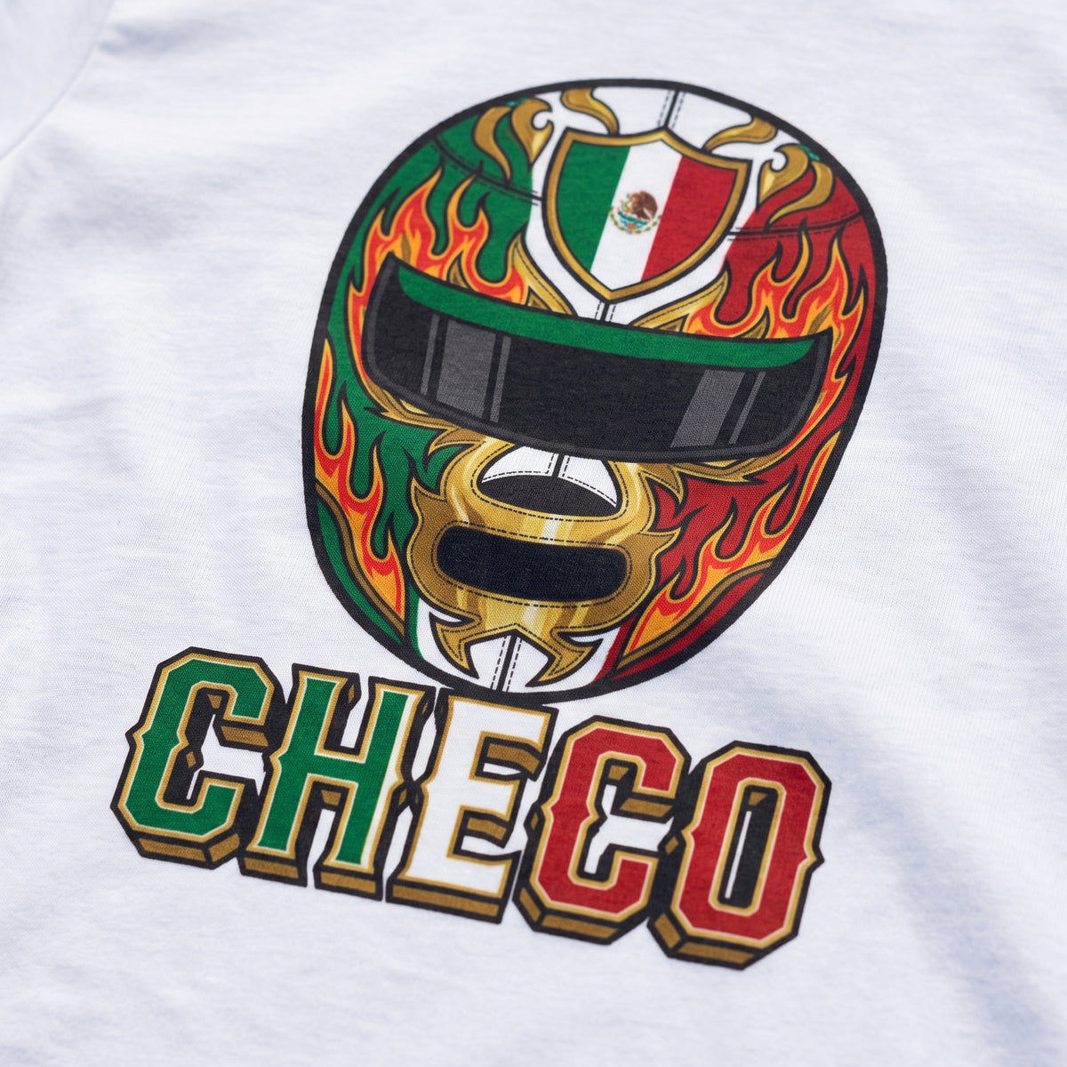 Close-up of the Checo Lucha Libre F1 t-shirt print on White cotton