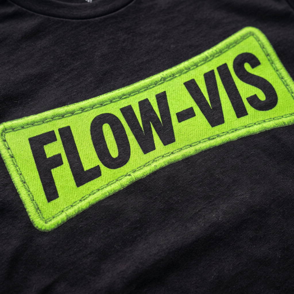 Close-up of the Flow-Vis F1 t-shirt print on Black cotton