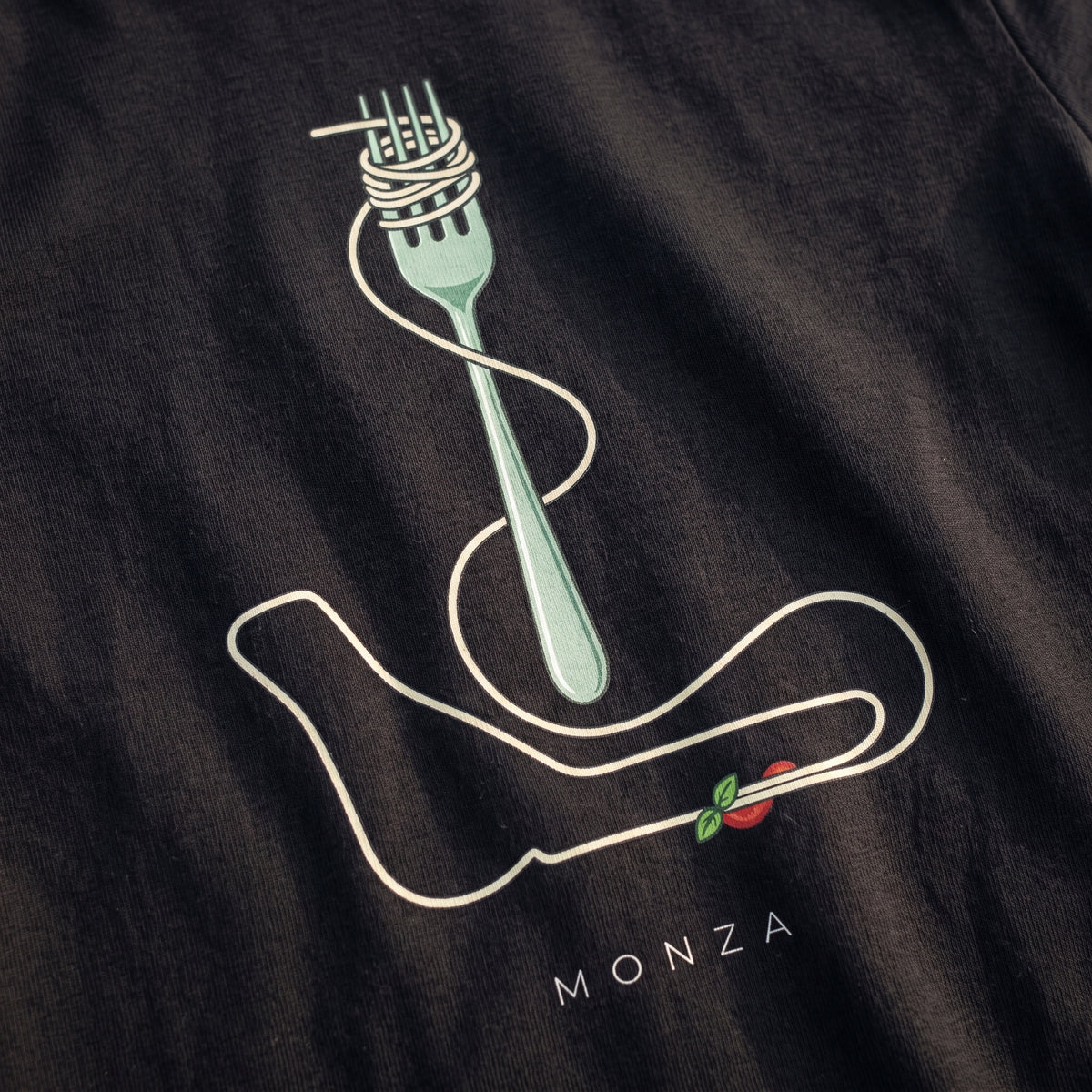 Close-up of the Flying Spaghetti Monza F1 t-shirt print on Black cotton