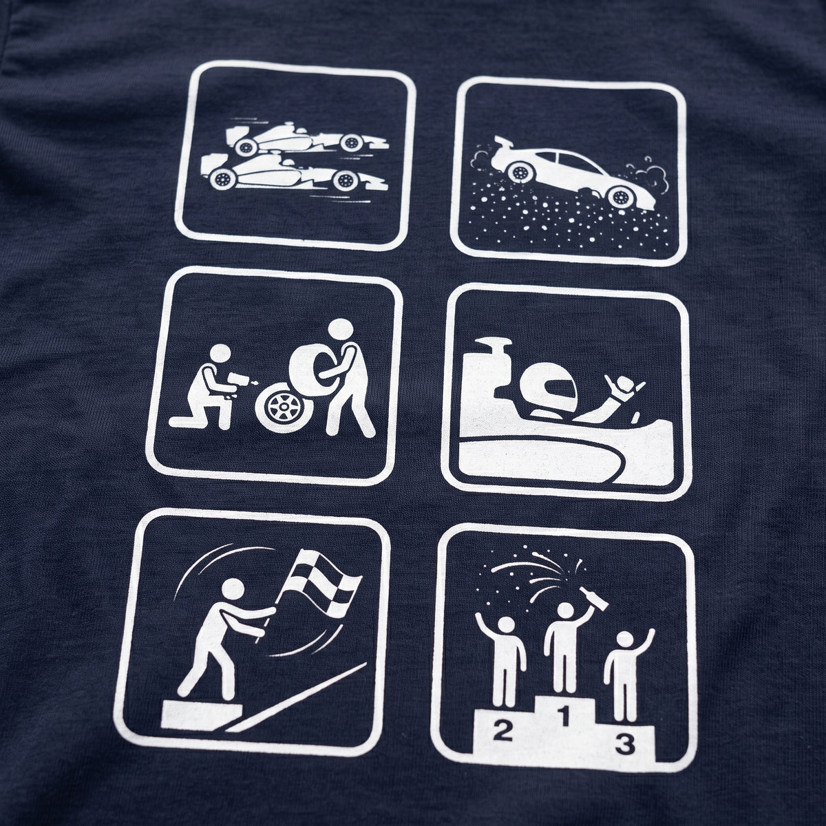Close-up of the Racing Pictogram F1 t-shirt print on Navy cotton