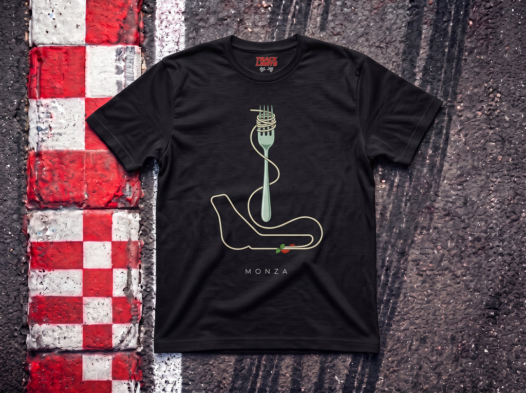Flying Spaghetti Monza F1 t-shirt in Black, flat lay on a race track kerb