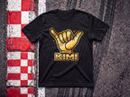 Kimi Antonelli Shaka F1 t-shirt in Black, flat lay on a race track kerb