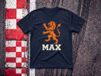 Max the Lion Heart F1 t-shirt in Navy, flat lay on a race track kerb